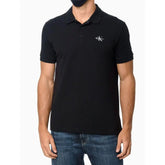 POLO CKJ MASC MC LOGO RE ISSUE PEITO PRETO