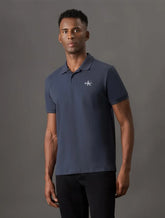 POLO CKJ MASC MC LOGO RE ISSUE PEITO MARINHO