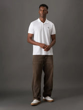 POLO CKJ MASC MC LOGO RE ISSUE PEITO BRANCO