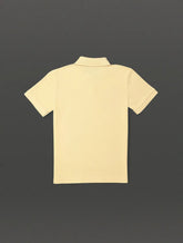 POLO CKJ KIDS MAS LOGO RE ISSUE PEITO AMARELO MANTEIGA