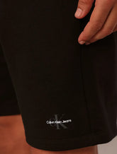 BERMUDA CKJ MAS MOLETOM RE ISSUE PRETO