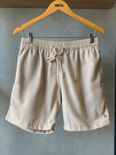 SHORT LINHO MASC LISO AREIA