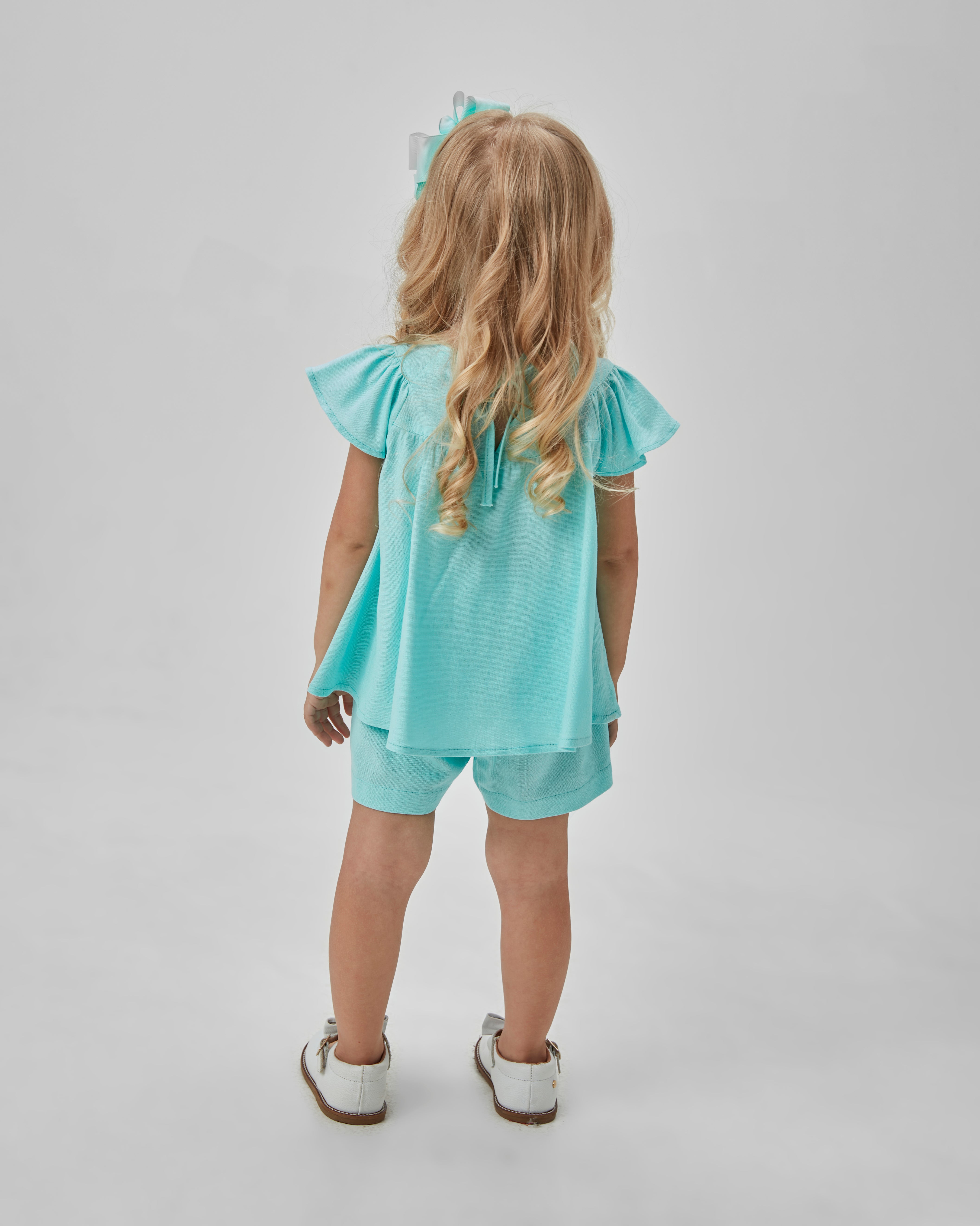 CONJ FEM BATA GODE C APLIQ LASER E SHORT ACQUA