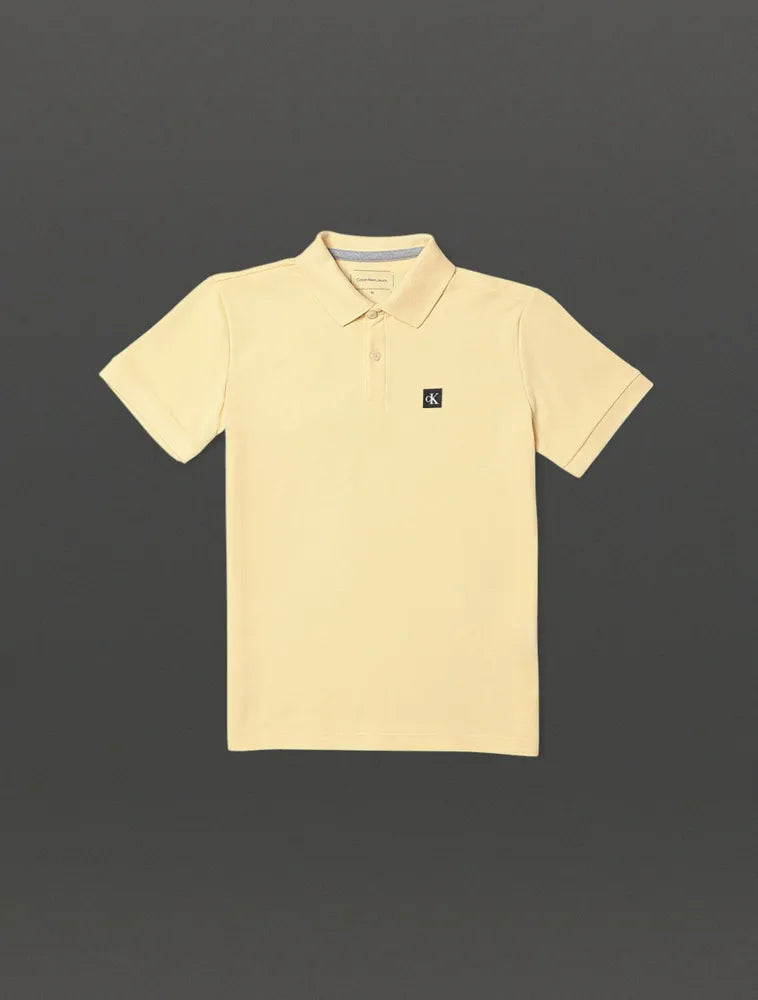 POLO CKJ KIDS MAS MC PREMIUM AMARELO MANTEIGA