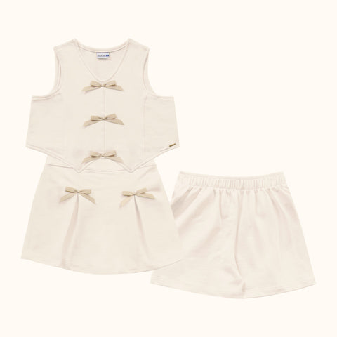 CONJ FEM REG E SHORT SAIA PREGAS C LACOS BAUNILHA