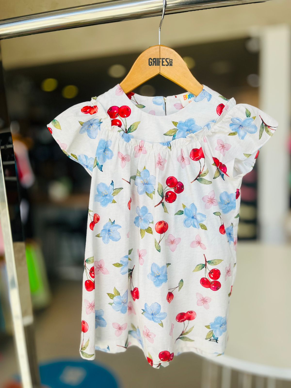 VESTIDO ESTAMPADO EVASE C DET DE PICUETA BEGE CLARO