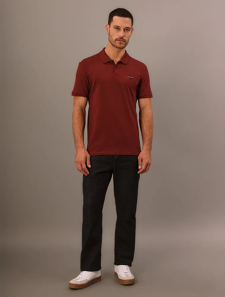 POLO CKJ MASC MC LOGO RE ISSUE PEITO BORDO